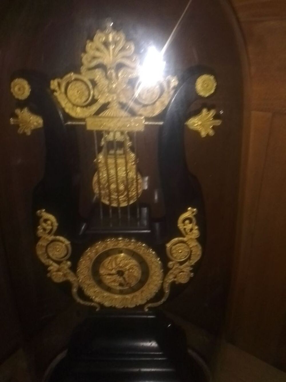 Pendule lyre sous globe empire 