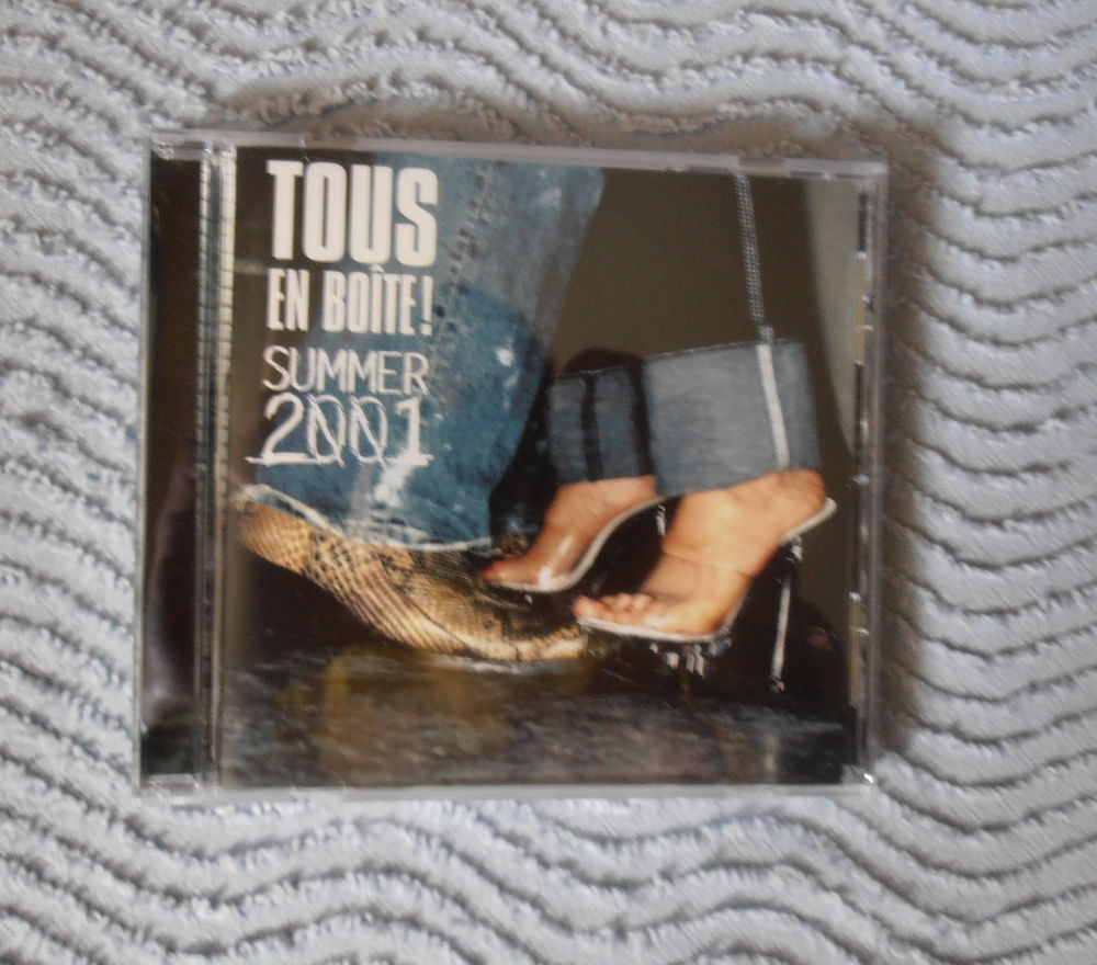 CD Tous En Bo&icirc;te! Summer 2001
CD et vinyles