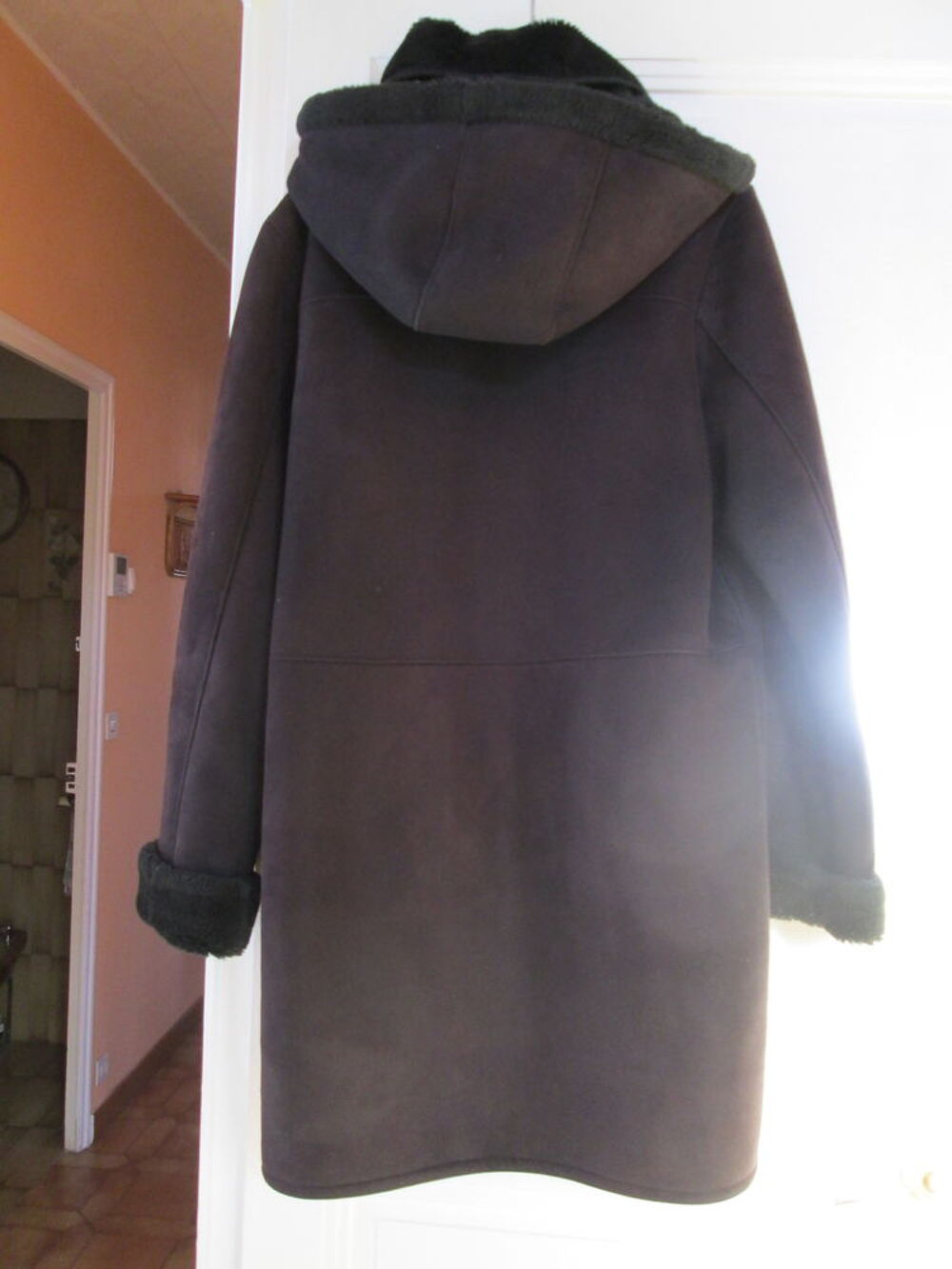 manteau en peau retourn&eacute;e Vêtements