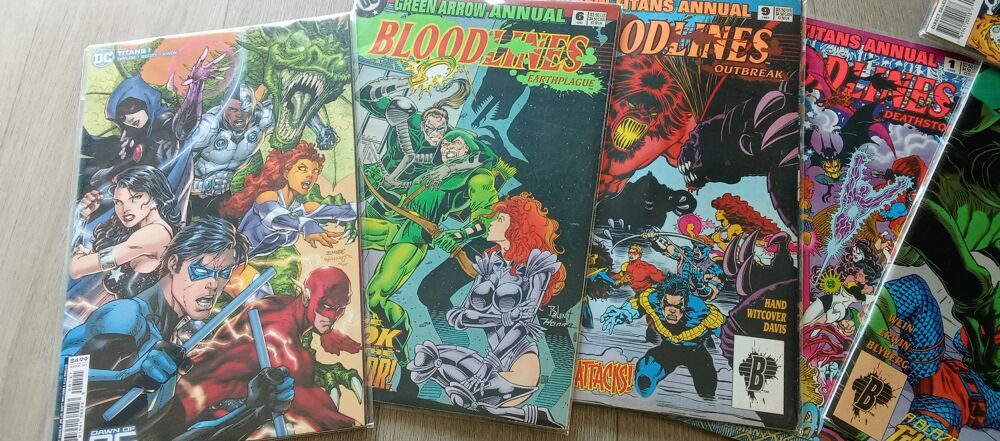 Lot 9 comics us en vo cot&eacute;s et neufs et prot&eacute;g&eacute;s Livres et BD