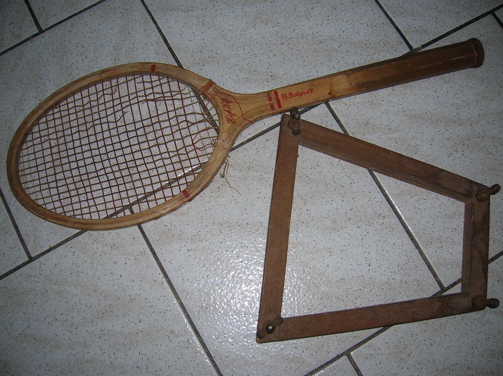 raquette de tennis vintage et sa presse en bois 