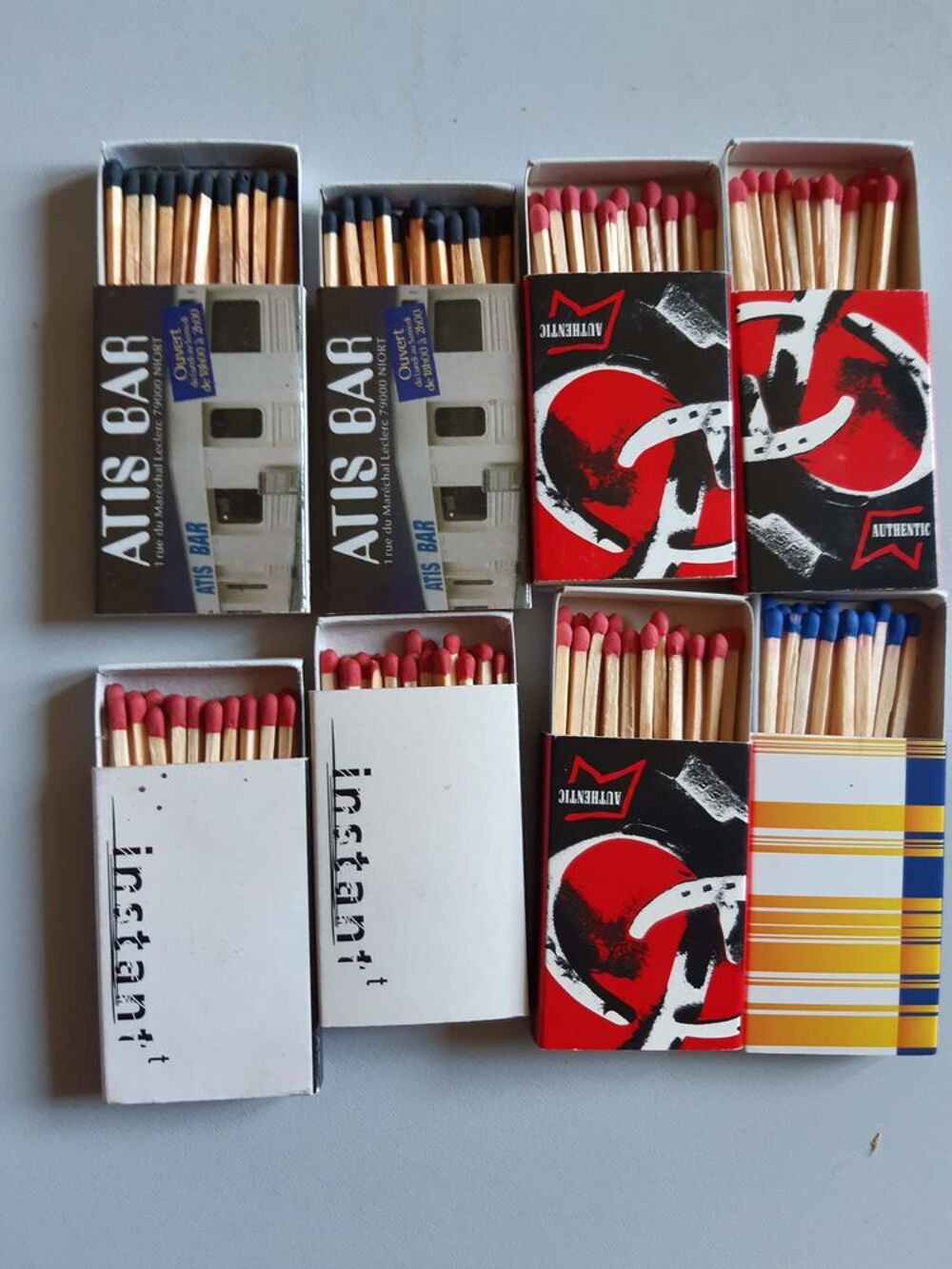 Lot de 8 boites d'allumettes publicitaires 