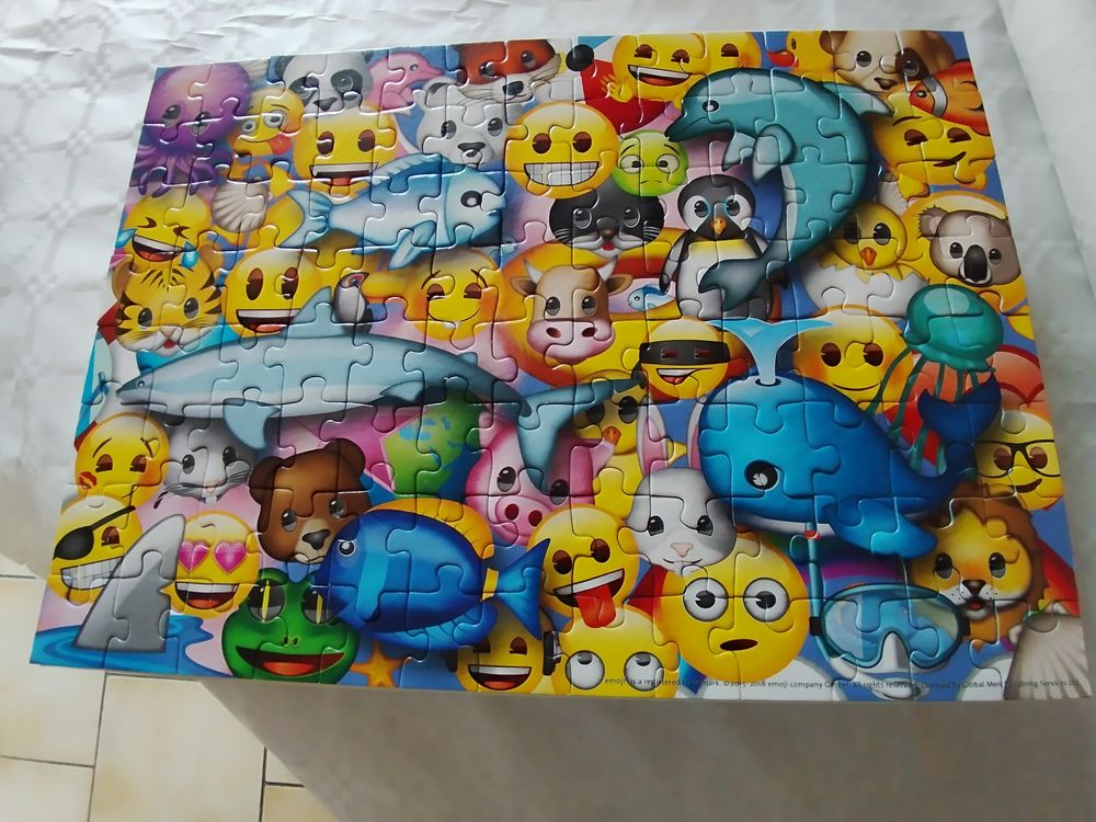 Ravensburger Puzzle Emoji 4 x 100 pi&egrave;ces Jeux / jouets