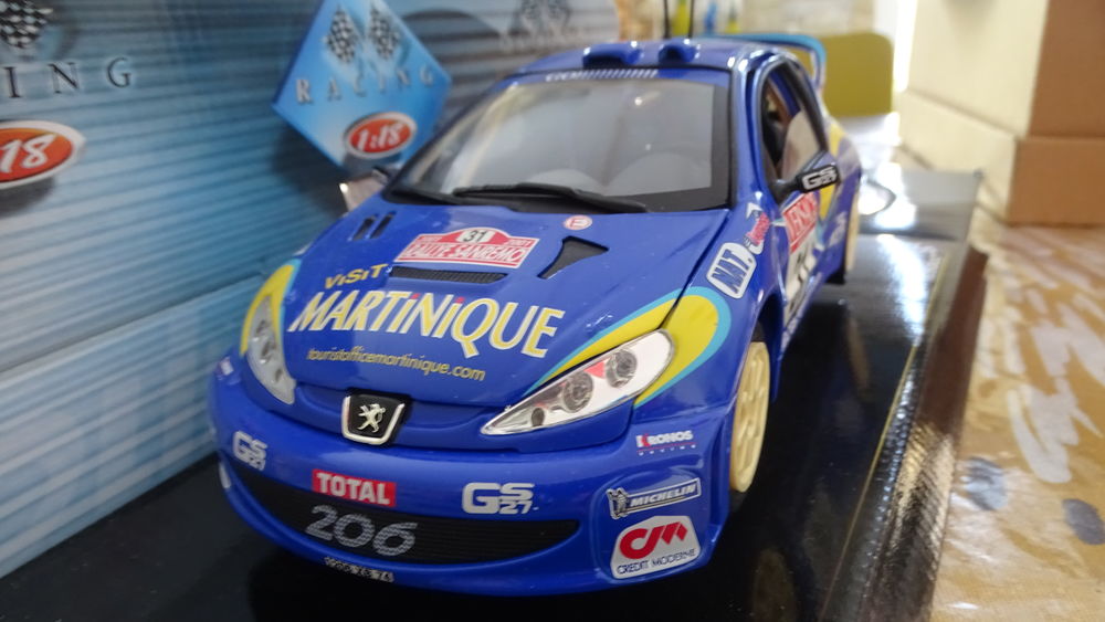 Miniatures 1/18 PEUGEOT 206 WRC de chez SOLIDO Jeux / jouets