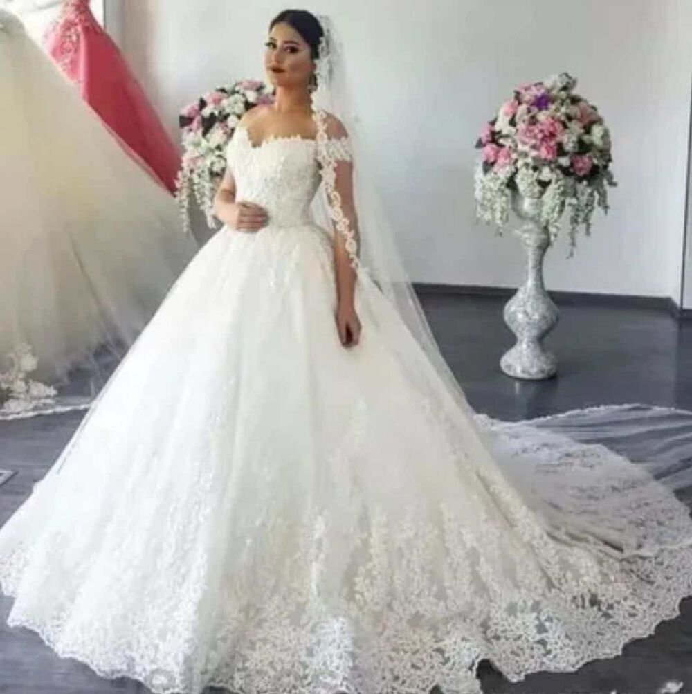 Robe de mari&eacute;e casi neuve Vtements