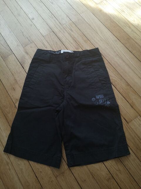 F 9 E (5) - 6 ans - Short noir  Go Sport  2 Paris 13 (75)