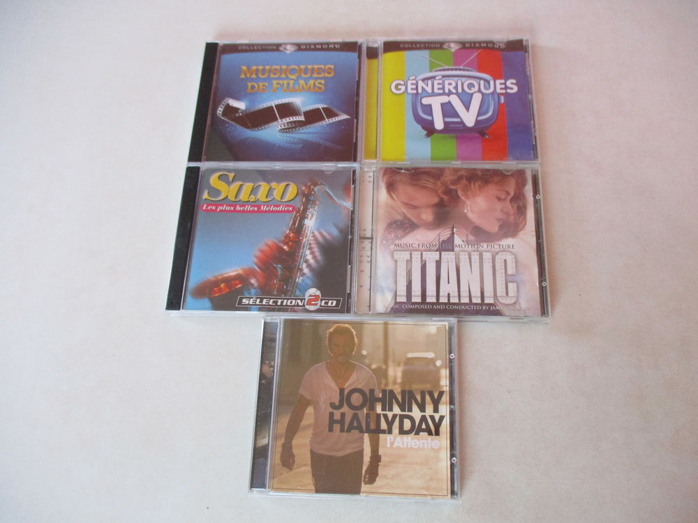 Lot de cinq CDS CD et vinyles