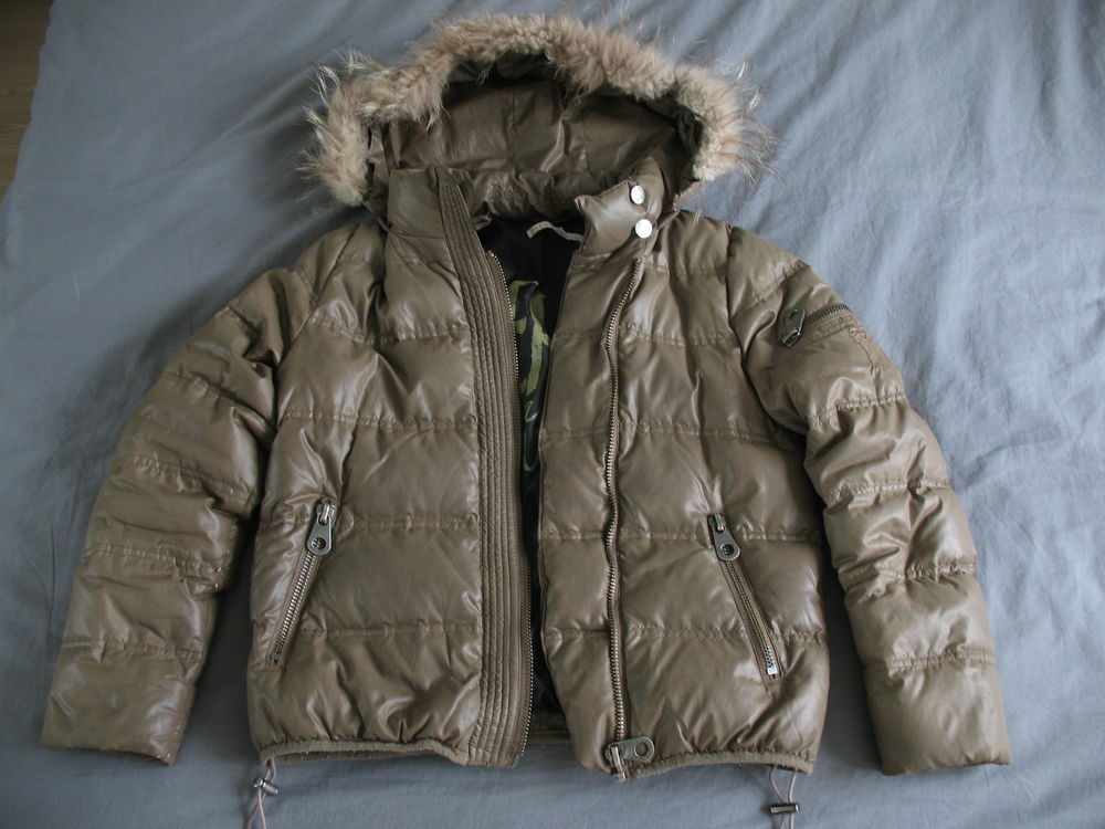 DOUDOUNE BERENICE TAILLE 12 ANS
Vêtements enfants