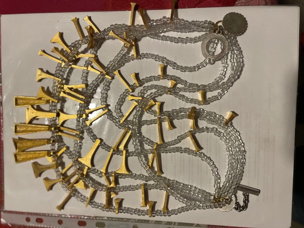 Collier d&eacute;fil&eacute; 8 rangs enfilage perles motifs dor&eacute;s ANTIGONA Bijoux et montres