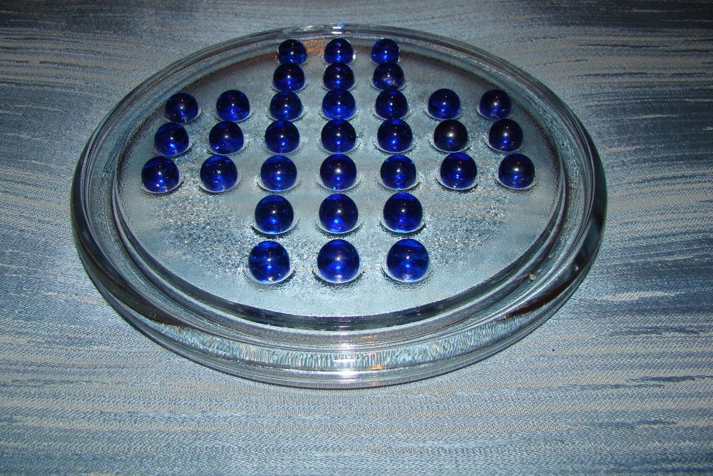 Jeu de solitaire en verre
Jeux / jouets