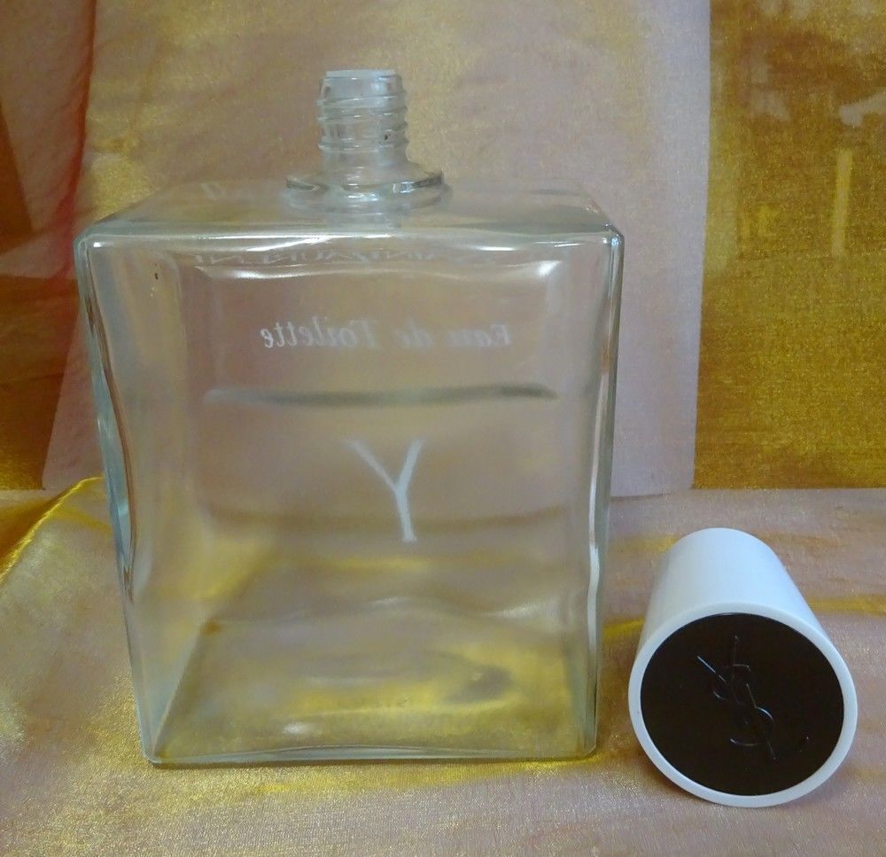 Flacons vides d'eau de toilette YVES ST LAURENT 