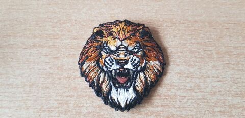petit �cusson brod� 
t�te de lion
5x4,5 cm
thermocollant 4 Carnon Plage (34)