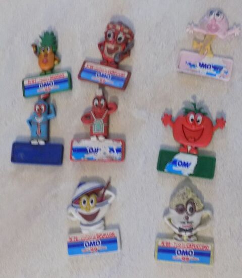 8 magnets lessive Omo 1 La Motte-d'Aveillans (38)