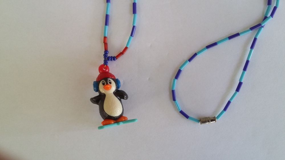 Pendentif , collier avec un pingouin Bijoux et montres