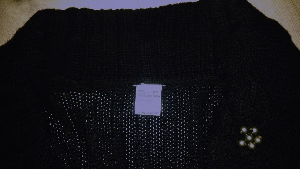 gilet noir en tricot
Vtements