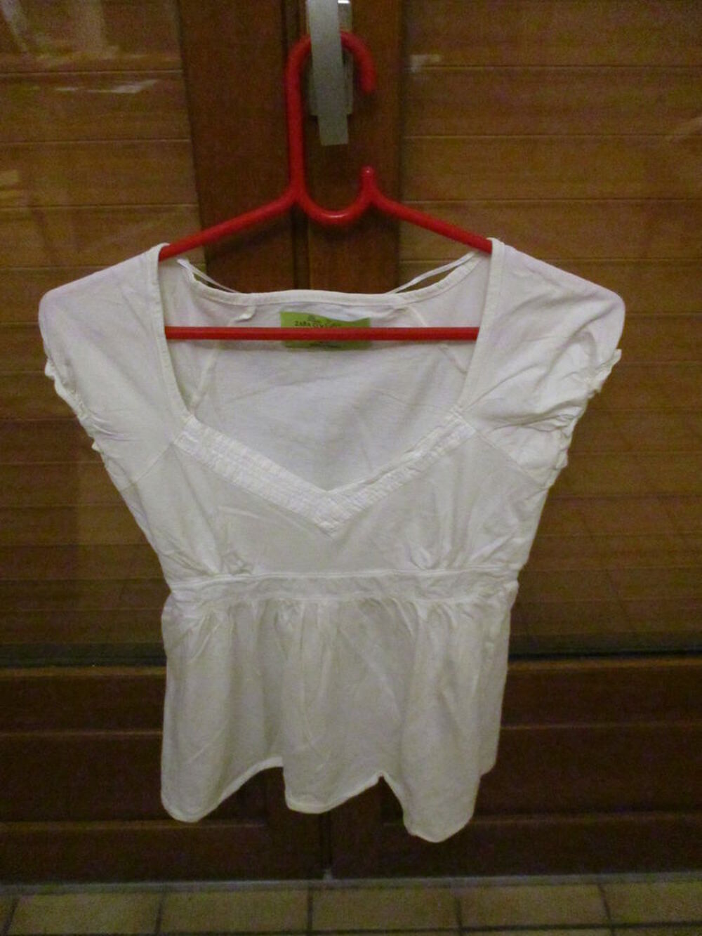un lot de 2 articles haut : un blanc et un rose Vêtements