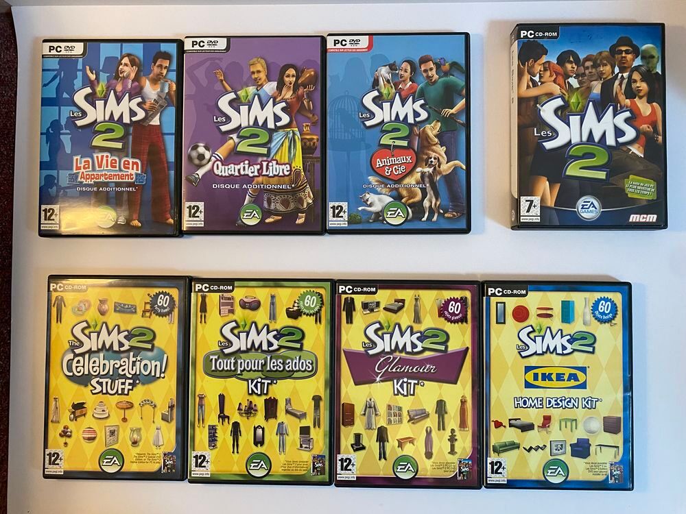 Les Sims 2 (Les Sims 2 + 3 disques additionnels + 4 kits) Consoles et jeux vidos