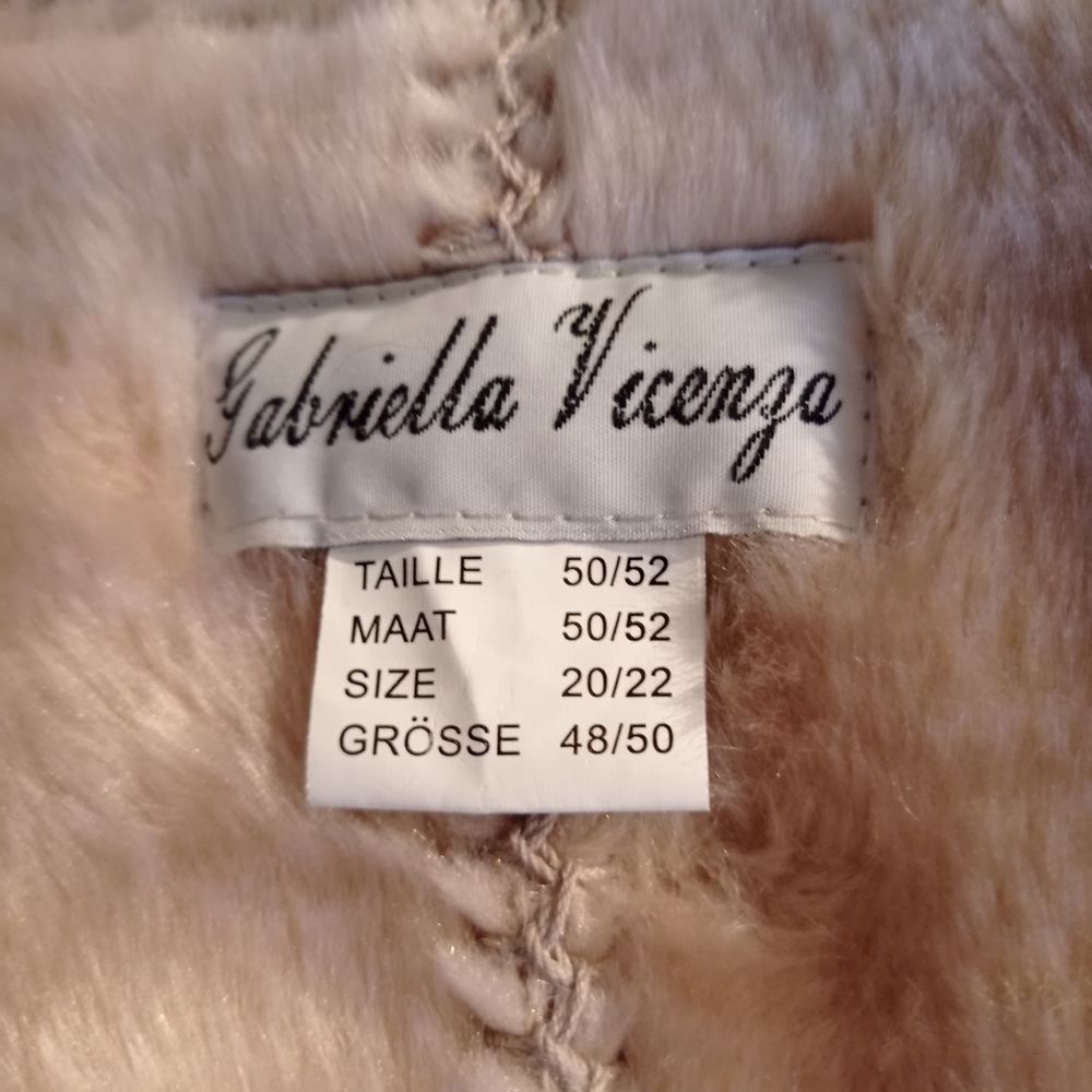 Manteau imitation peau retourn&eacute;e Vêtements