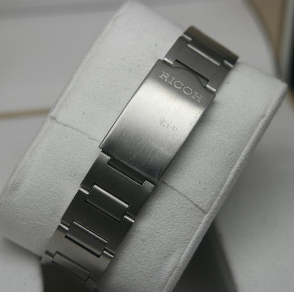 Ricoh automatique vintage en excellent &eacute;tat + bo&icirc;te Bijoux et montres
