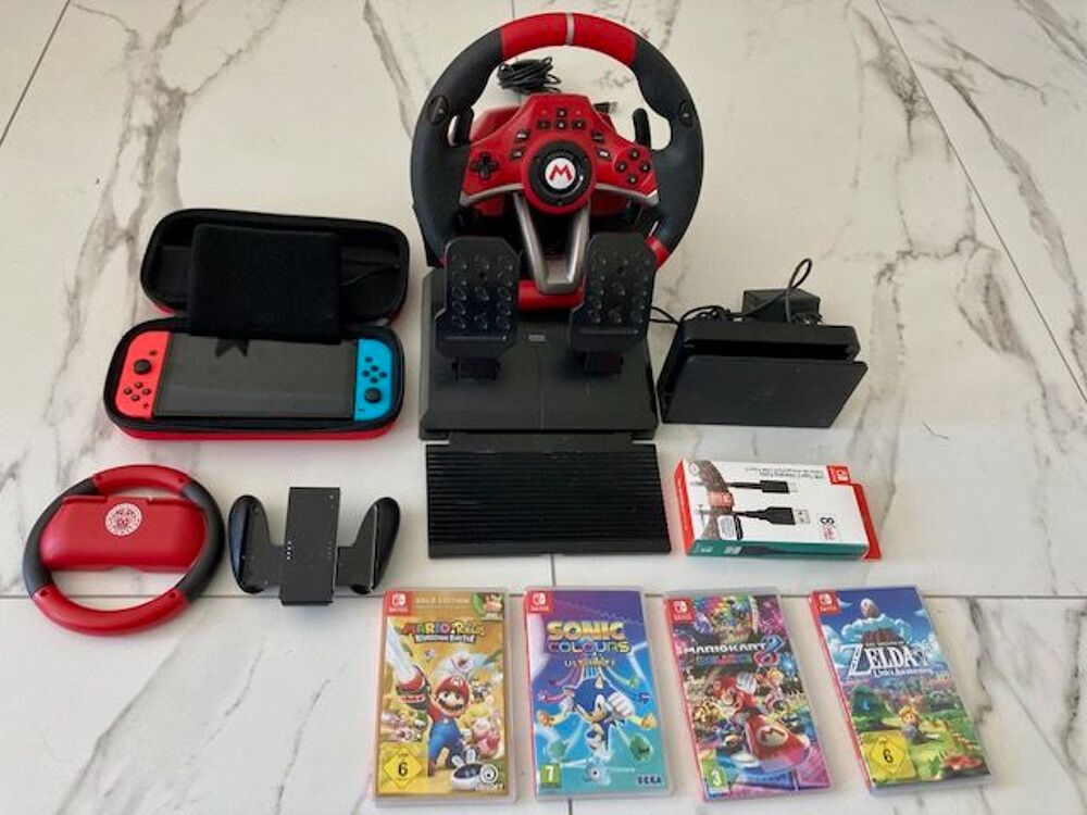 Nintendo Switch Oled + accessories + jeux Consoles et jeux vidéos
