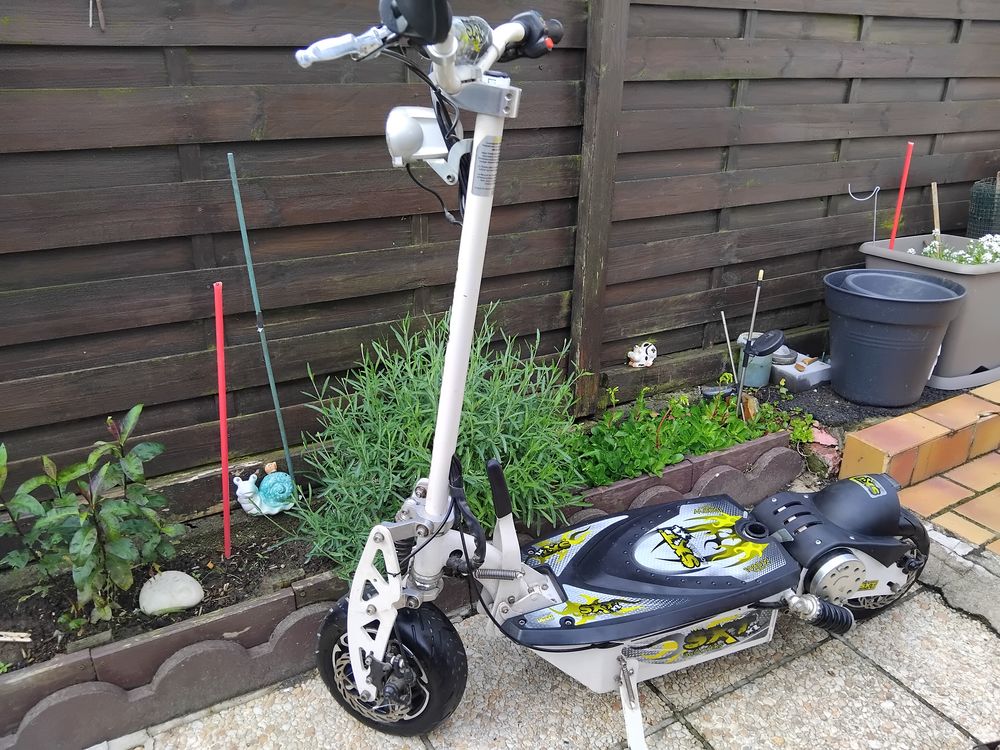 Trottinette &eacute;lectrique (scooter sxt1000 ) Sports
