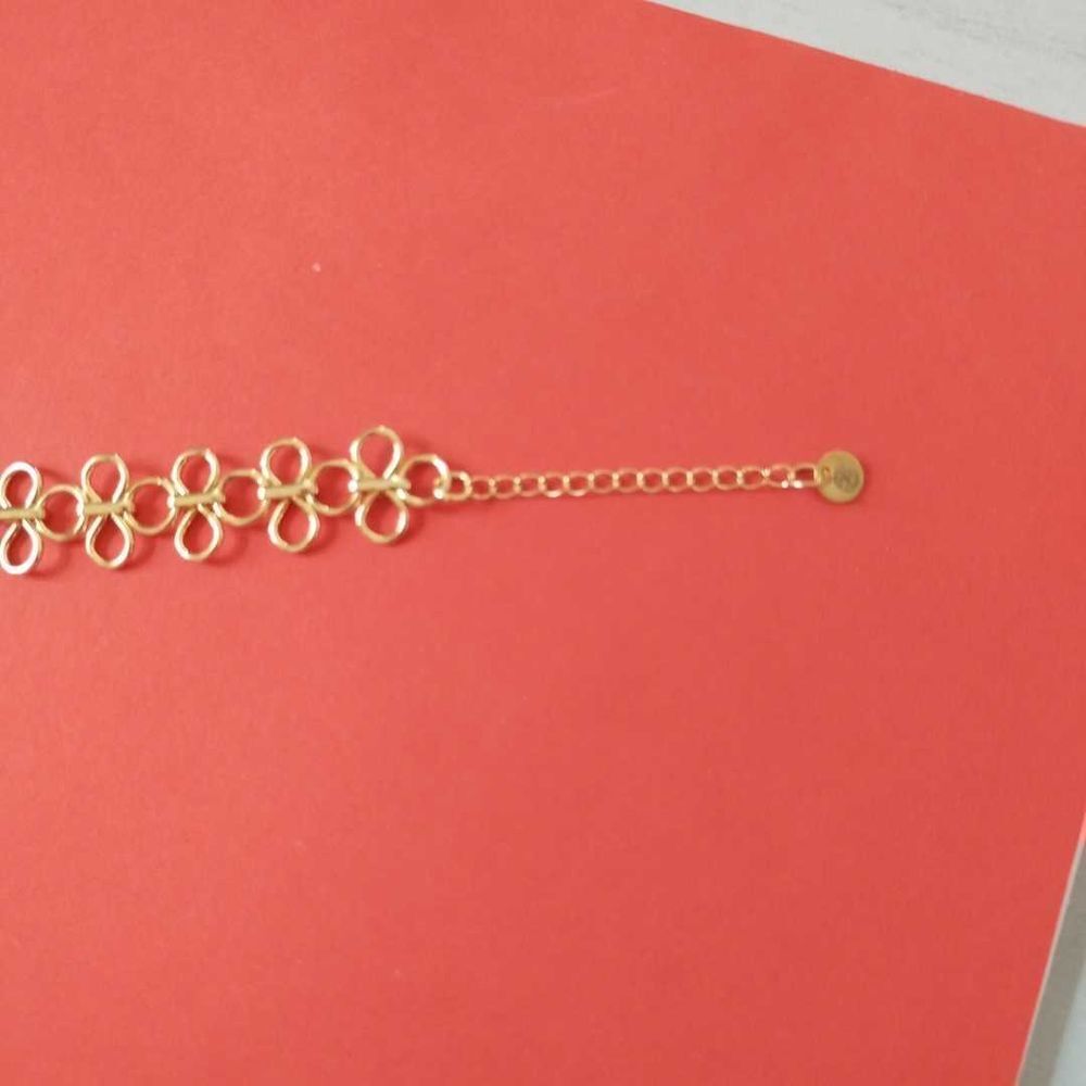 tr&egrave;s beau bracelet finition dor&eacute; femme Christian Lacroix Bijoux et montres