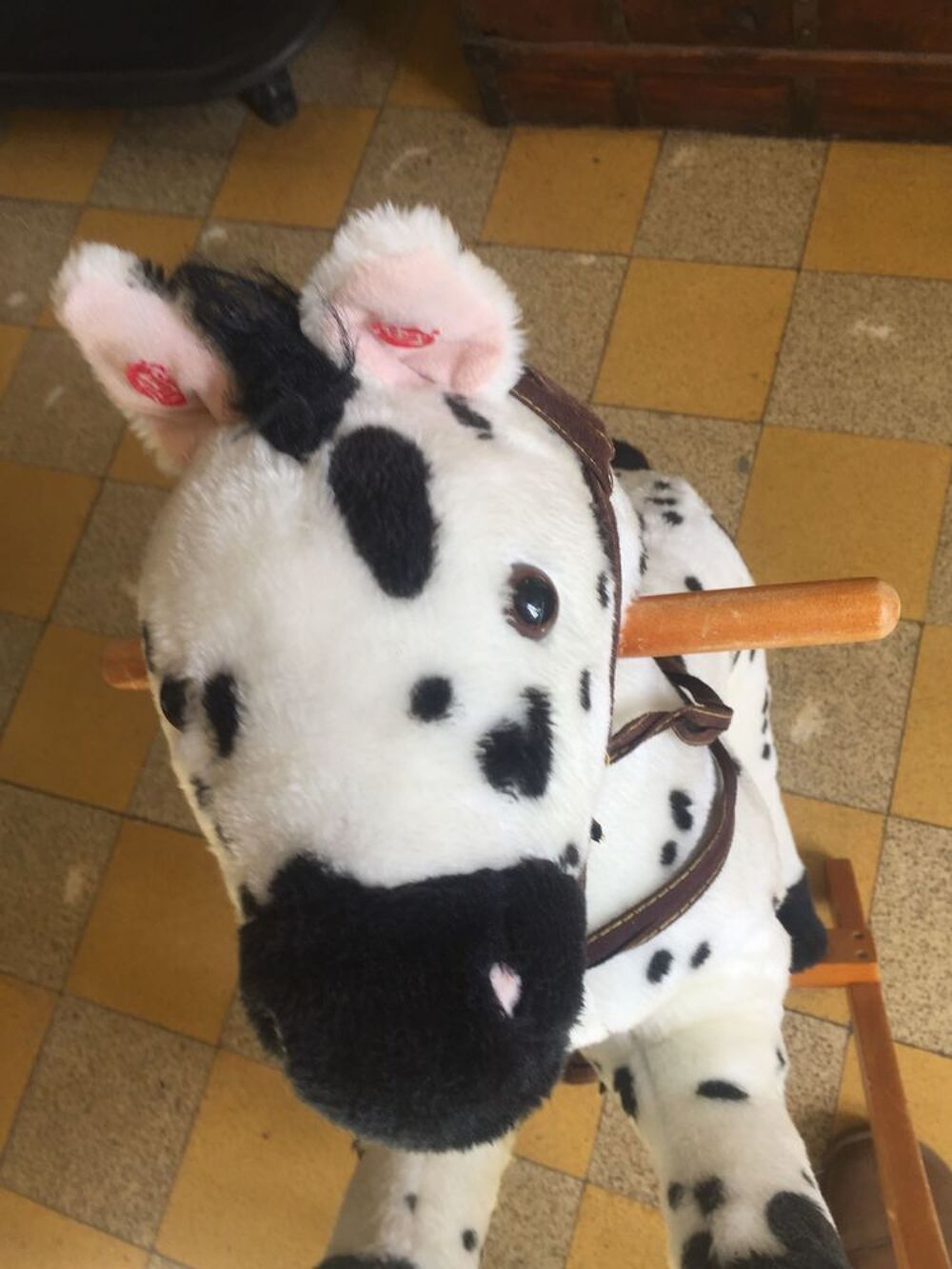 UN CHEVAL A BASCULE POUR ENFANT Jeux / jouets