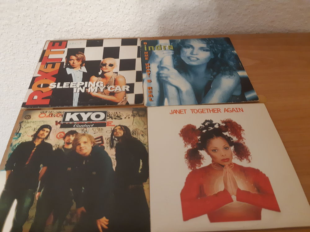 CD 2 titres lot de 4 rock et dance 90 CD et vinyles