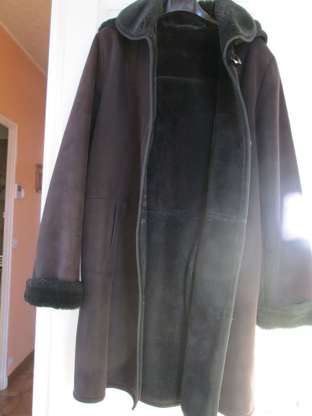 manteau en peau retourn&eacute;e Vêtements