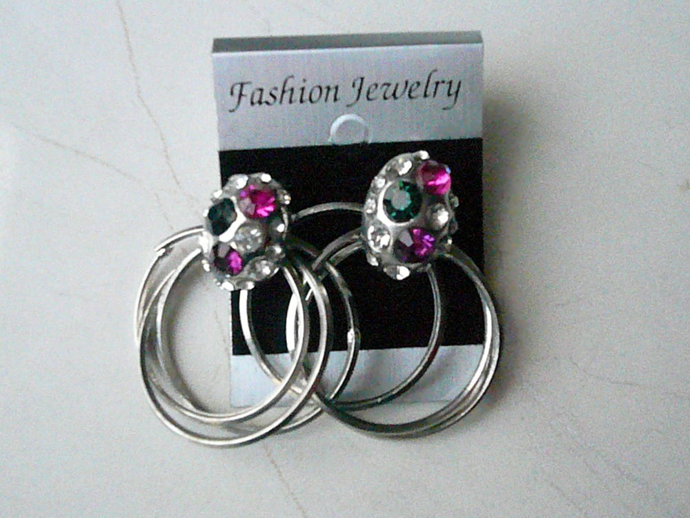 Boucles d'oreilles anneaux et pierres Bijoux et montres