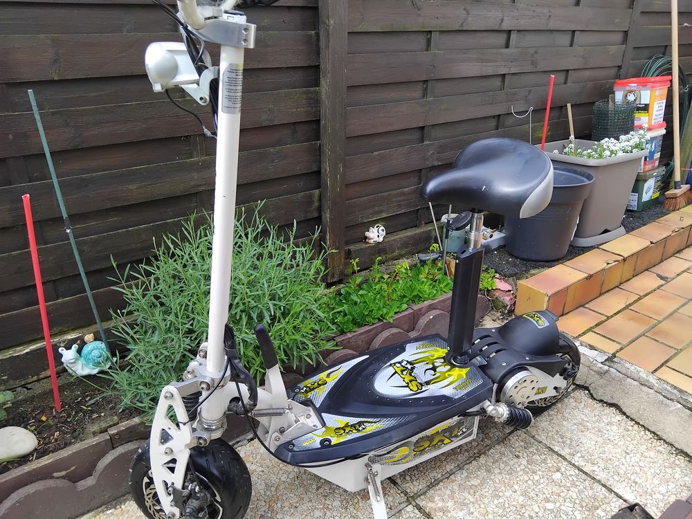 Trottinette &eacute;lectrique (scooter sxt1000 ) Sports