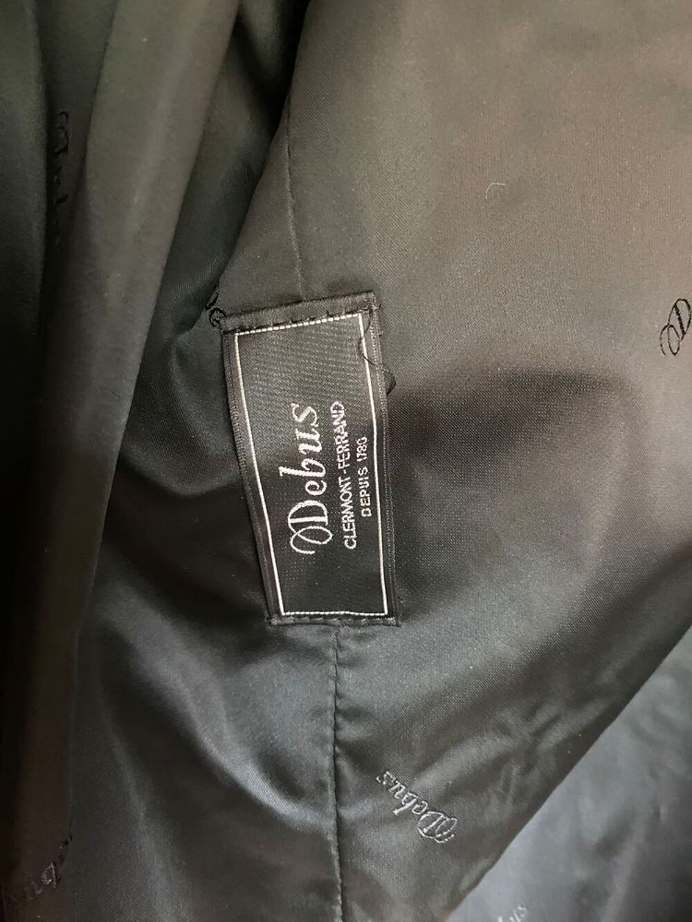 manteau en astrakan 
Vêtements