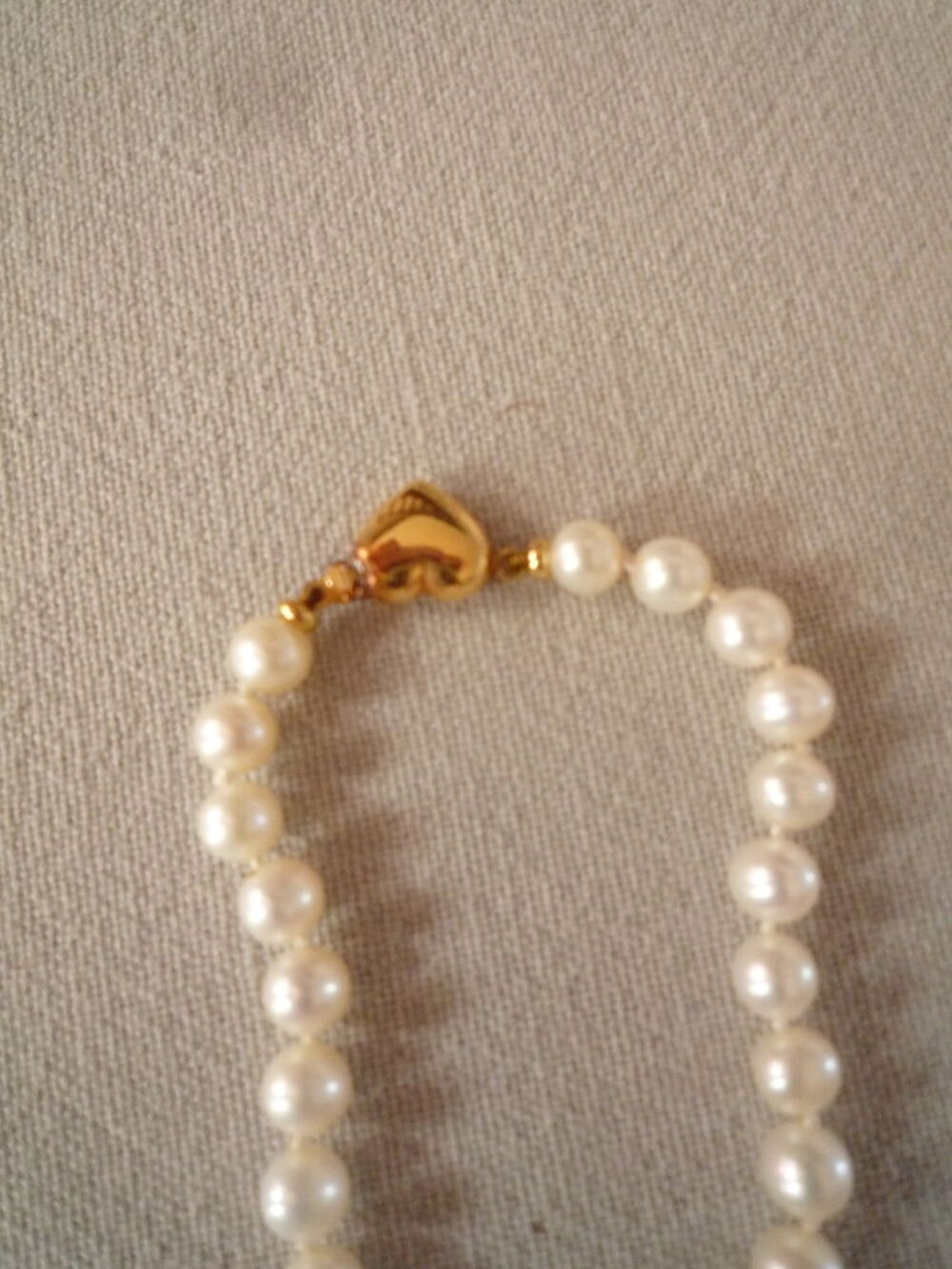 Collier en perles fines. Bijoux et montres