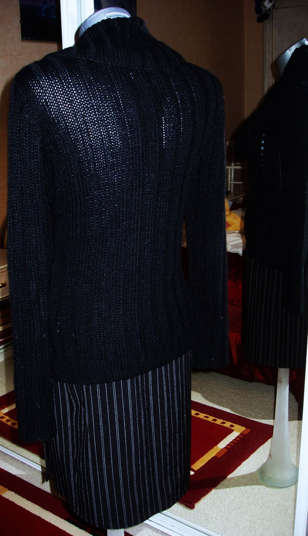 gilet noir en tricot
Vêtements