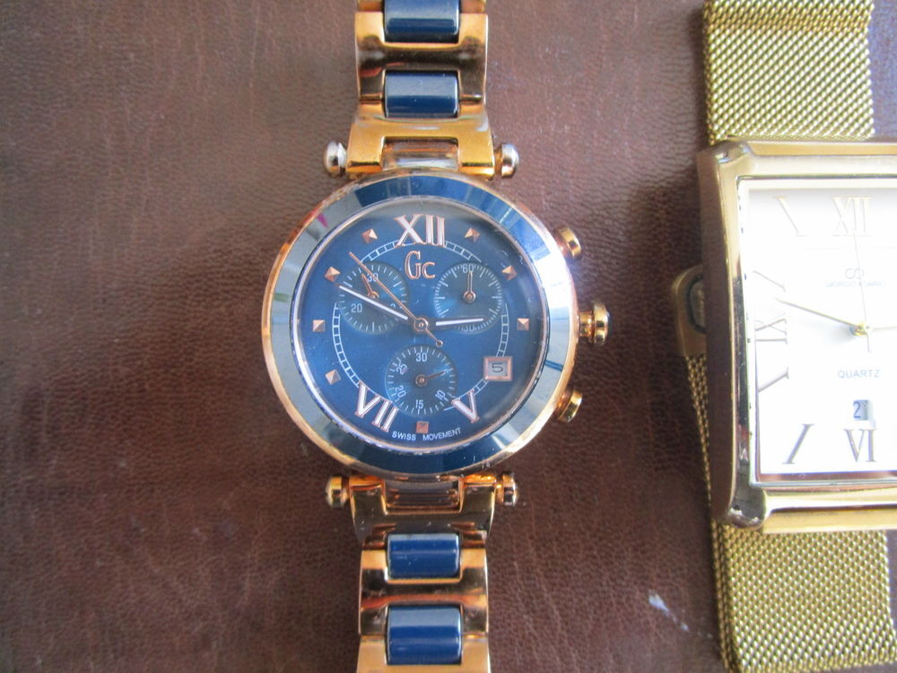 lot de 2 montres en tbe Bijoux et montres