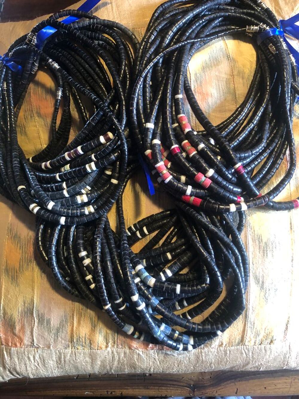 FAIRE PROPOSITION: COLLIER SURFER COQUILLAGE GRD nombre 
Bijoux et montres