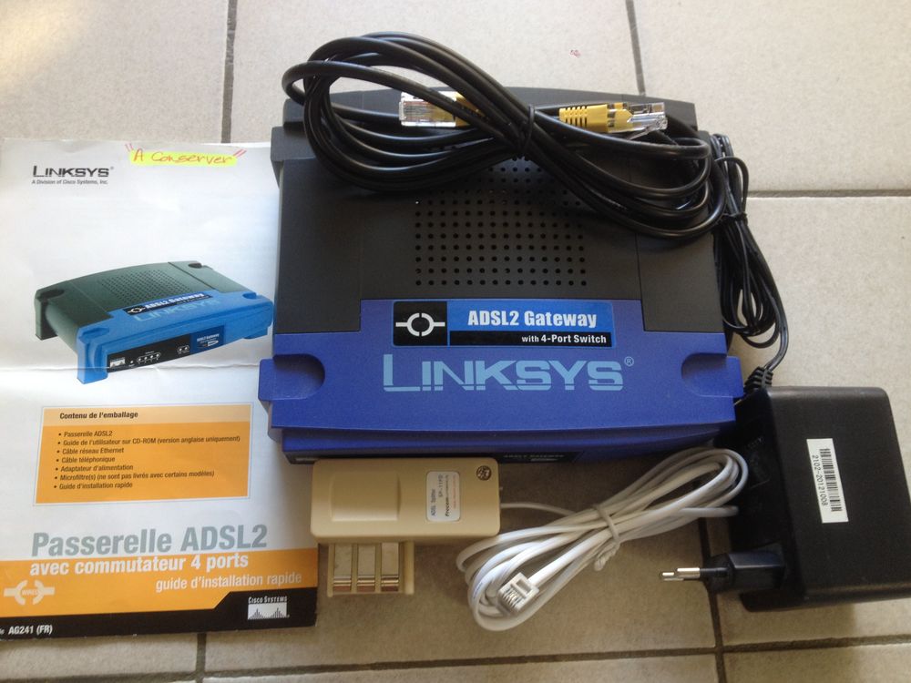 Passerelle ADSL2 &amp; commutateur 4 ports LINKSYS ( AG241 ) Matériel informatique