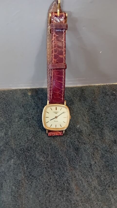 Montre Longines dore avec bracelet en cuir bordeaux 150 Attignat (01)