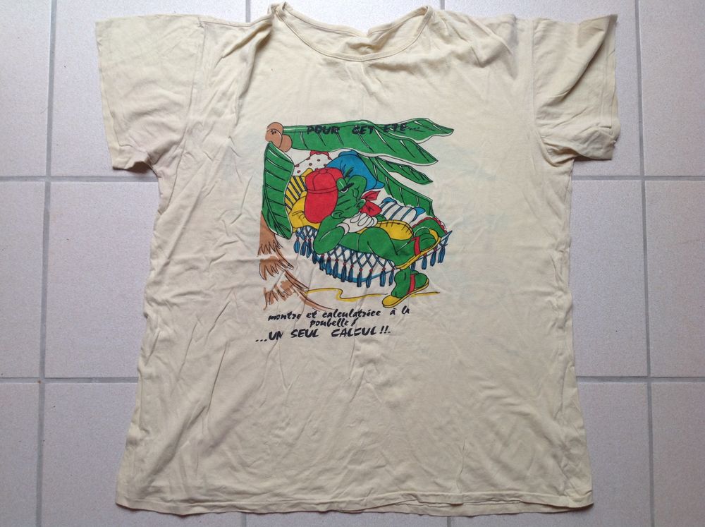 TEE SHIRT JAUNE MOTIF CROCODILE RECTO/VERSO Envoi Possible
Vêtements