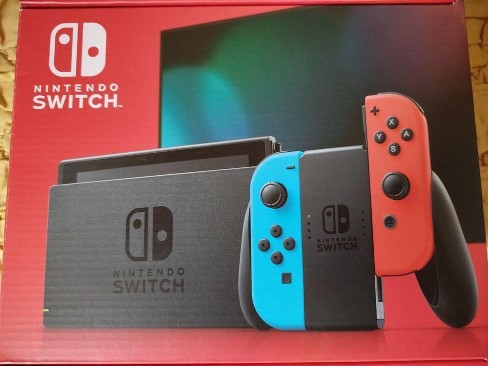 Nintendo Switch neon rouge/bleu Consoles et jeux vidéos