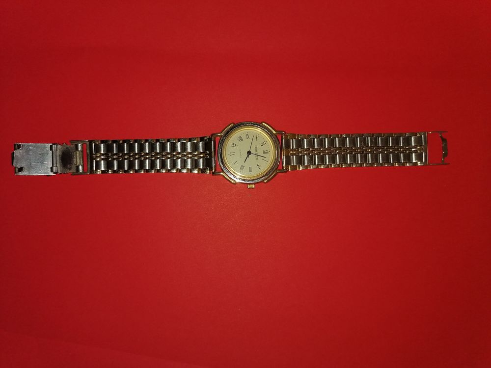 Montre quartz Cartier acier et dor&eacute; tres bon &eacute;tat g&eacute;n&eacute;ral Bijoux et montres