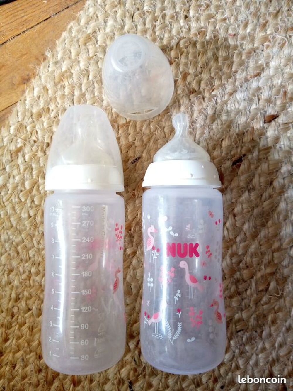 2 biberons Nuk 300 ml avec t&eacute;tine anti colique Puériculture