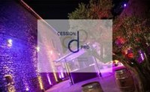   A VENDRE GRANDE SALLE DE RECEPTION ATYPIQUE AVEC LOGEMENT ET PARKING. 