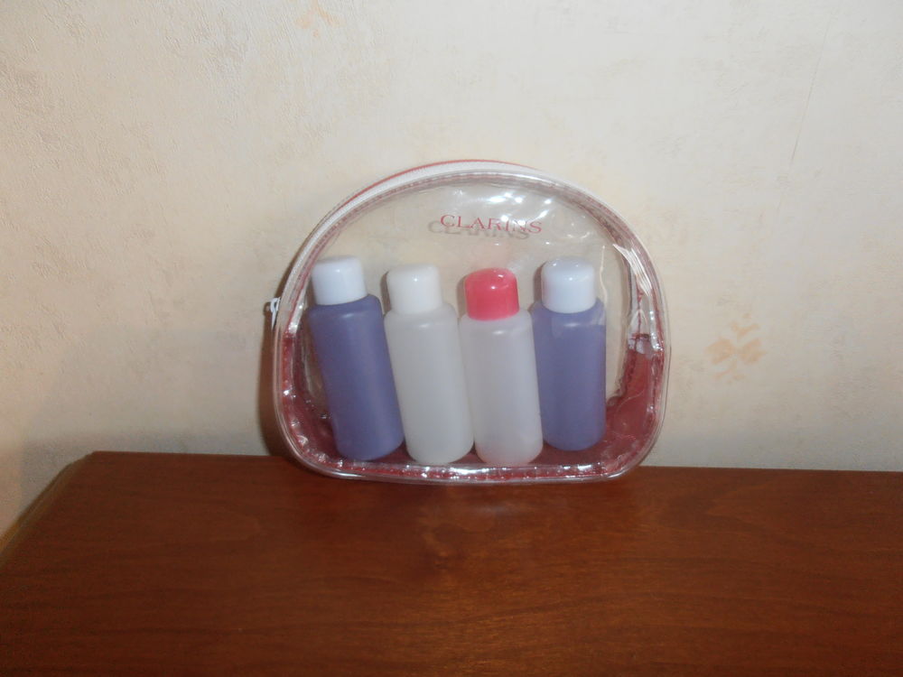 Trousse Clarins et flacons de voyage 1 (63) Maroquinerie