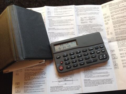 CALCULATRICE DE BANQUE DE DONN�ES ETAT NEUF 5 Tr�gunc (29)