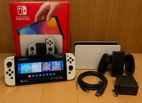 Nintendo Switch OLED Blanche �  Etat comme neuf �  Compl�te avec bo�te et facture 150 Paris 1 (75)
