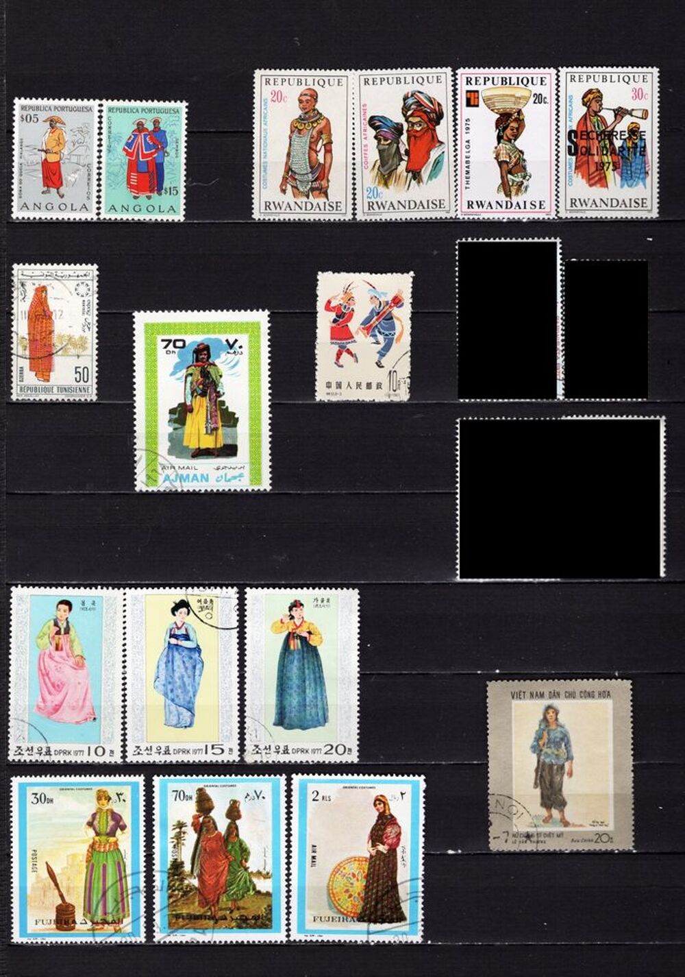lot de 48 timbres du MONDE sur les COSTUMES TRADITIONNELS 