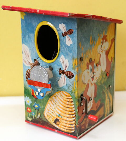 Tirelire mécanique ancienne LBZ la pie voleuse
tôle 50 Issy-les-Moulineaux (92)