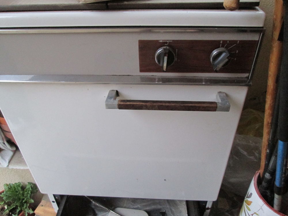 poele en fonte bois charbon Electroménager