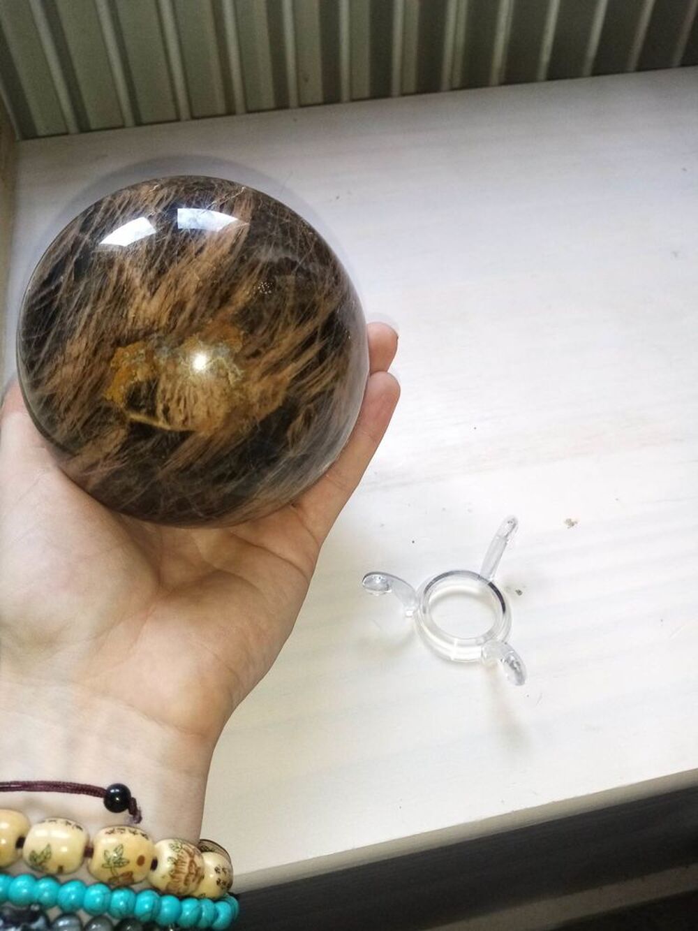Boule en pierre d'?il du tigre 1205g. Bijoux et montres